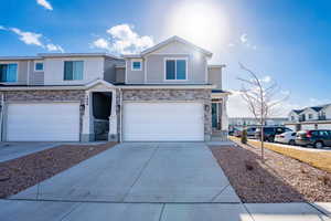 View of front of property featuring a garage