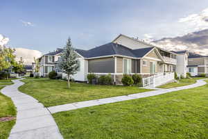 View of front of property featuring a front yard