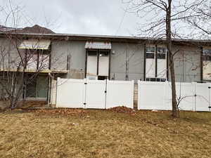 View of home's exterior with a lawn