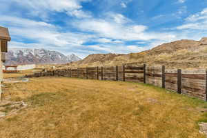 View of yard featuring a mountain view and a rural view