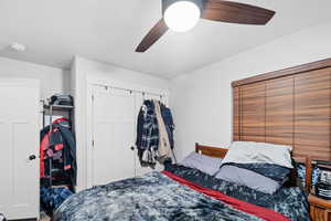 Bedroom with a closet and ceiling fan