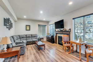 Living room featuring a fireplace and hard wood floors