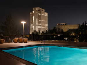 View of pool at night