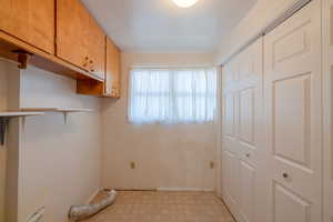 Washroom featuring cabinets