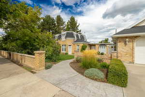 View of home with garage