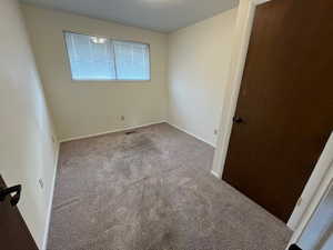 Spare room with light carpet