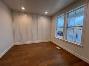 Entry room with hardwood / wood-style floors