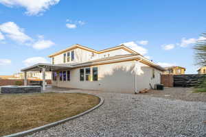 Rear view of property with cooling unit, a patio area, and a lawn, RV Parking