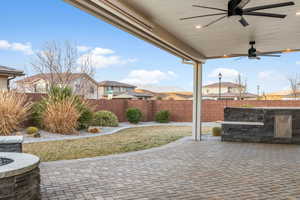 View of patio with ceiling fan