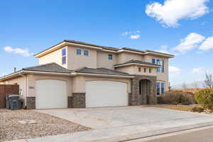 Prairie-style house featuring a garage