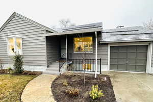 View of front of property with a garage