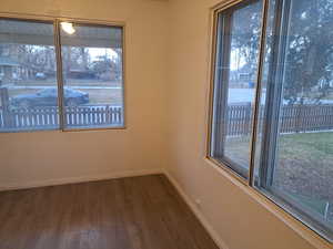 Unfurnished room featuring hardwood / wood-style floors