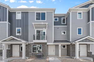 Multi unit property featuring central AC and a balcony