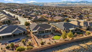 Birds eye view of property with a mountain view