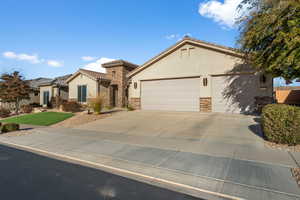 View of front of property featuring a garage