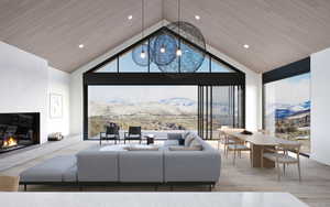 Living room with wood ceiling, high vaulted ceiling, a mountain view, a wall of windows, and hardwood / wood-style floors