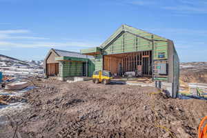 View of outbuilding featuring a mountain view