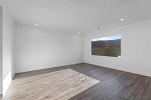 Unfurnished room featuring hardwood / wood-style floors