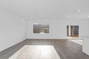 Spare room featuring hardwood / wood-style floors