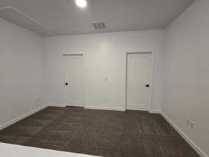 View of carpeted spare room