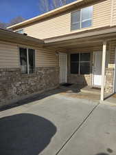 Entrance to property with a patio area