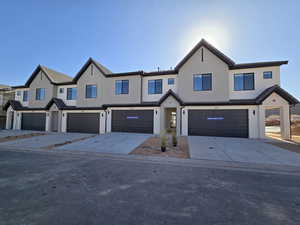 View of property featuring a garage