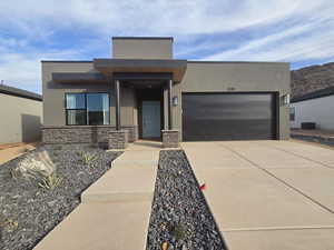 View of front of house with a garage