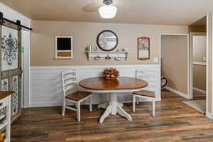 Dining room featuring breakfast area and dark hardwood / wood-style floors