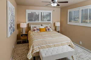 Bedroom featuring ceiling fan