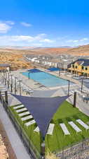 View of swimming pool featuring a mountain view