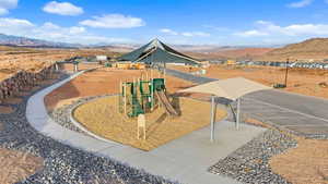 Exterior space featuring a mountain view and a playground