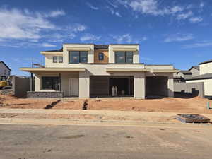 View of front facade with a garage