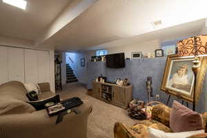 Living room carpeted flooring.