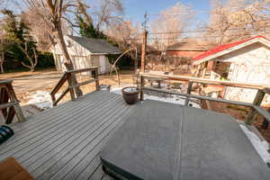 Large deck with hot tub.