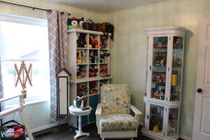 Bedroom 2  with a healthy amount of sunlight and dark wood-type flooring