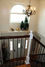 Entryway featuring plenty of natural light and wood-type flooring