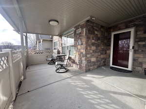 View of patio with covered porch