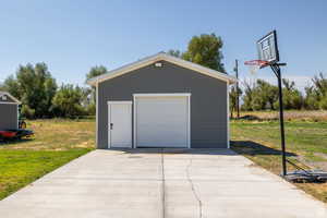 Garage with a lawn