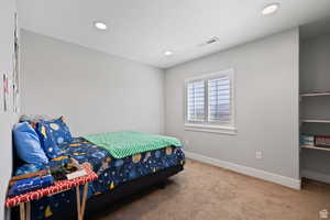 View of carpeted bedroom