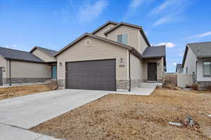 View of front of home with a garage