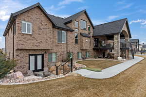 Exterior space featuring a lawn