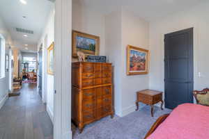 Bedroom featuring wood-type flooring