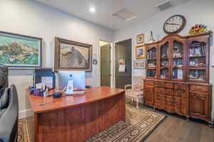 Office featuring hardwood / wood-style floors