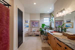 Bathroom with vanity and tile patterned flooring