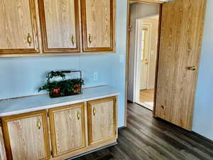 Kitchen featuring dark hardwood / wood-style flooring