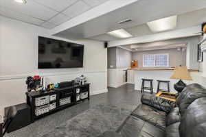 Living room with a drop ceiling