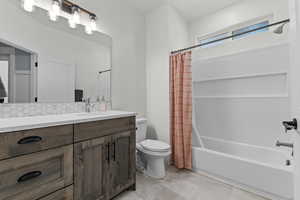 Guest full bathroom on main floor next to the mudroom