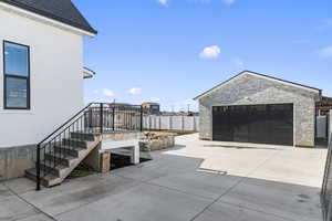 North side of home looking at the detached 2 car garage