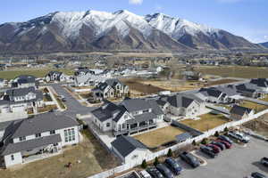 View of rear facade featuring a mountain view and a detached garage