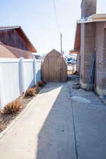 Exterior space with a storage shed